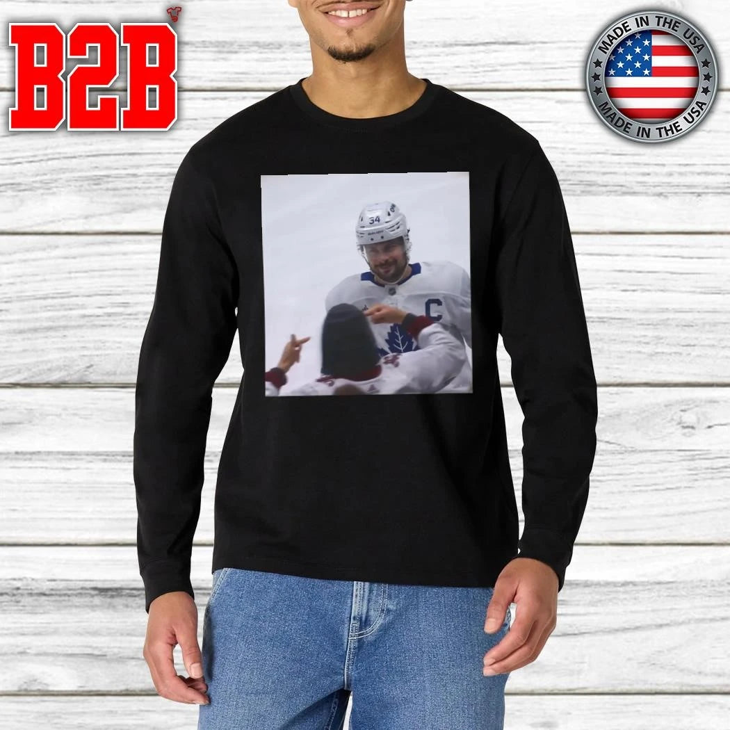 Auston Matthews Smirks At The Avs Fans Shirt