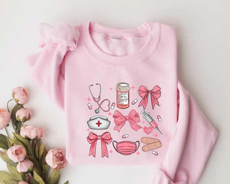 Coquette Nurse Sweatshirt, Pink Bow Nurse Sweatshirt, Girl Nurse Sweater, Nurse Graduation Shirt, Girly Nurse Birthday...