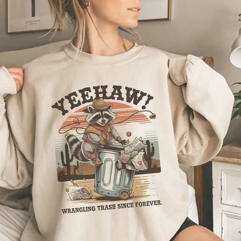 Yeehaw Wrangling Trash Since Forever Feral Racoon Crewneck Sweatshirt, Racoon Cowgirl Country Side Shirt