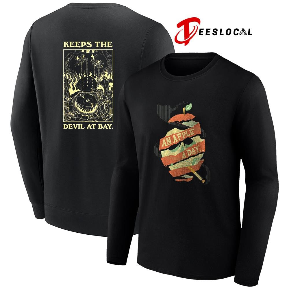 An apple a day keeps the devil at Bay graphic shirt