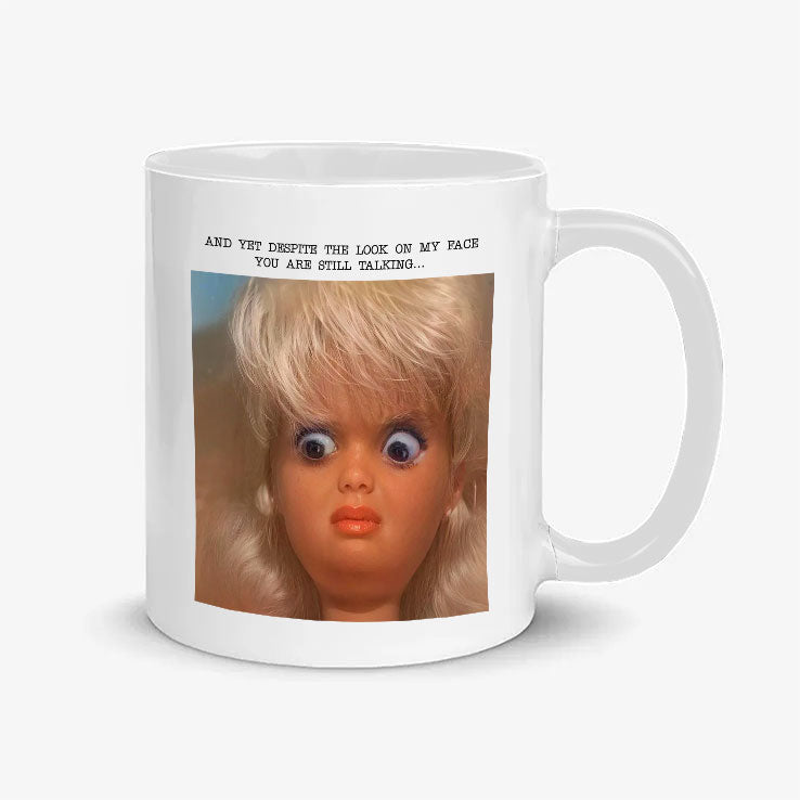 And Yet Despite The Look On My Face You Are Still Talking Funny Disgusted Doll Face Mug