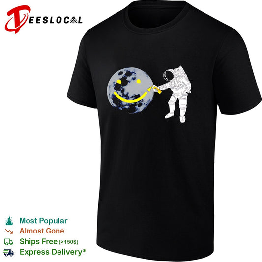 Astronaut spray painting smiley face on moon shirt