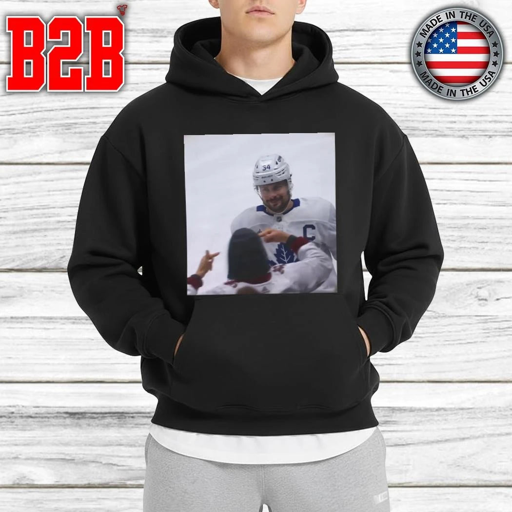 Auston Matthews Smirks At The Avs Fans Shirt