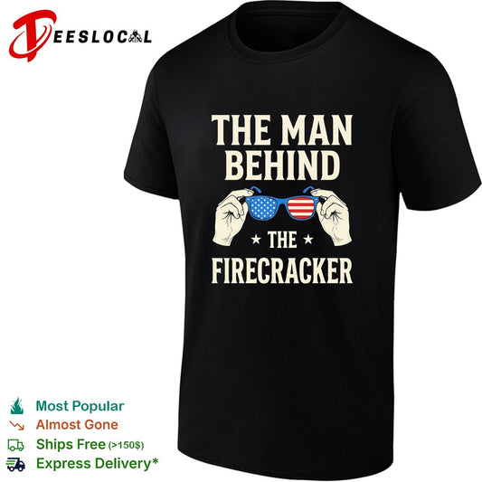 Holding sunglasses with USA flag pattern the man behind the firecracker retro shirt