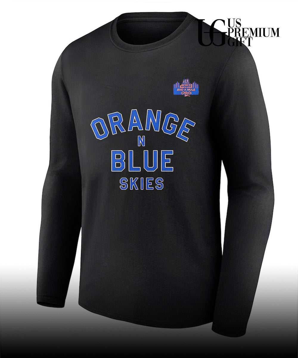 Spike Lee wearing Orange and Blue Skies 2026 Knicks Game 4 shirt