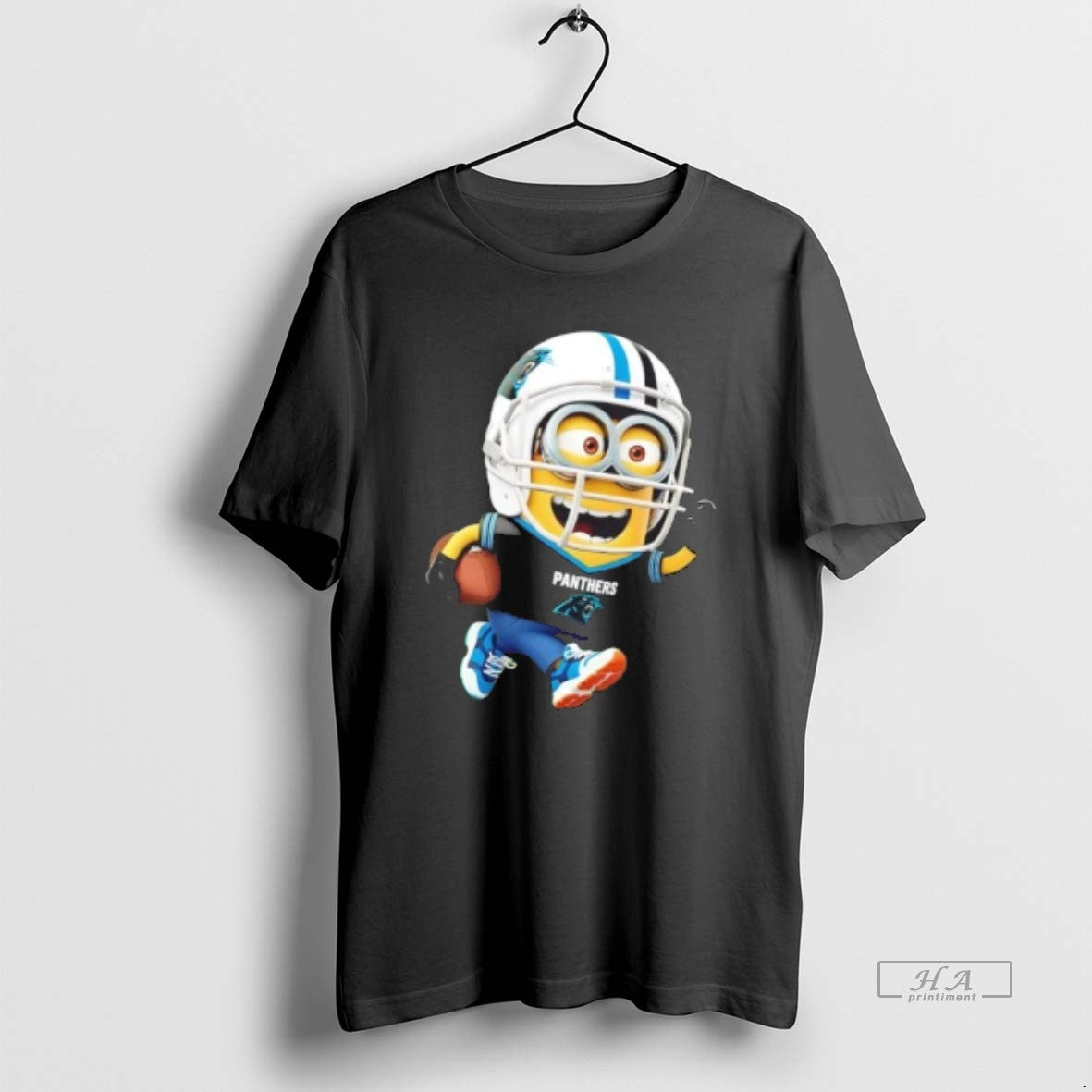 Trendy Minions Is Holding A Ball And Smiling At Carolina Panthers - clothing by TeeHivey.com
