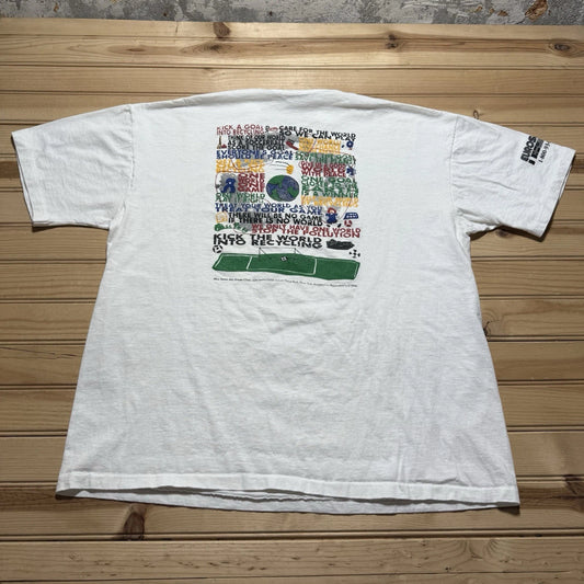 Vintage 90s Kids Who Care Soccer Kick The World Into Recycling Shirt Size XL