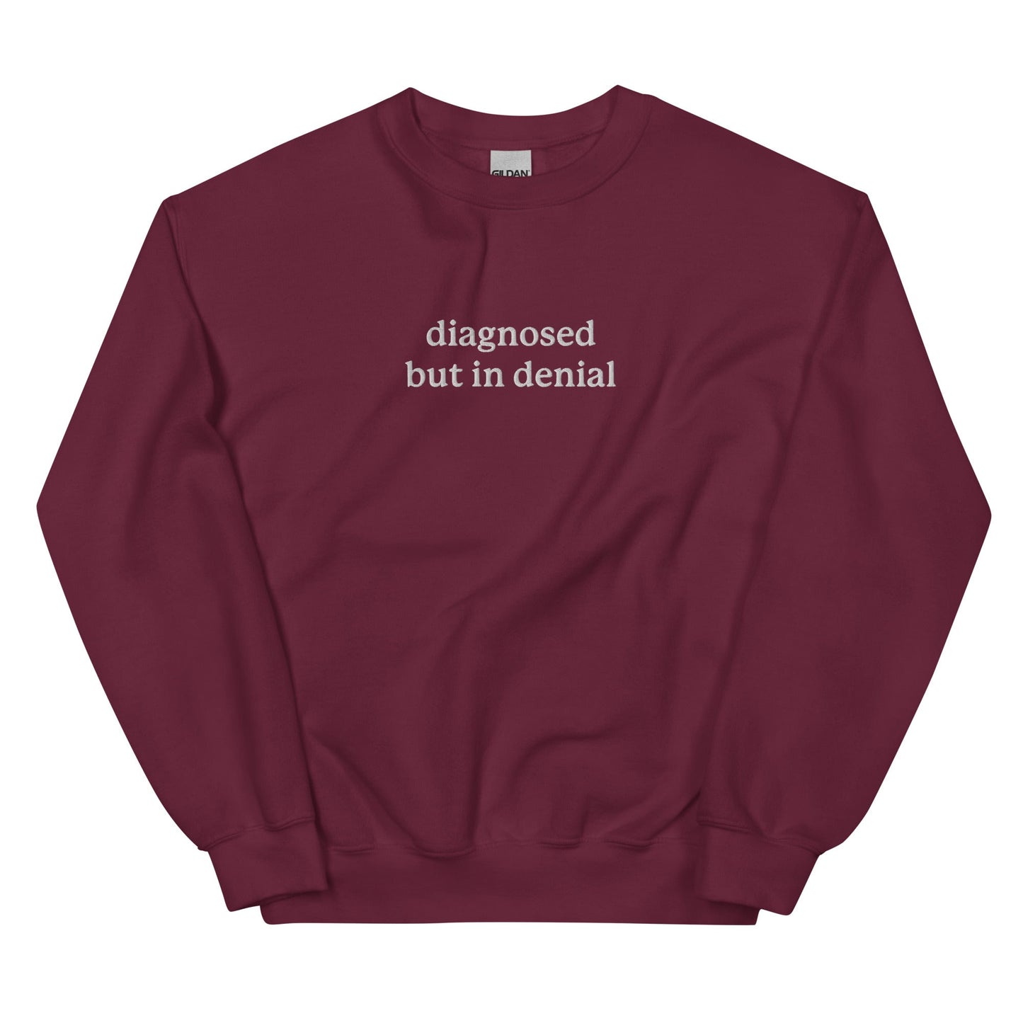 Diagnosed But in Denial Embroidered Unisex Sweatshirt